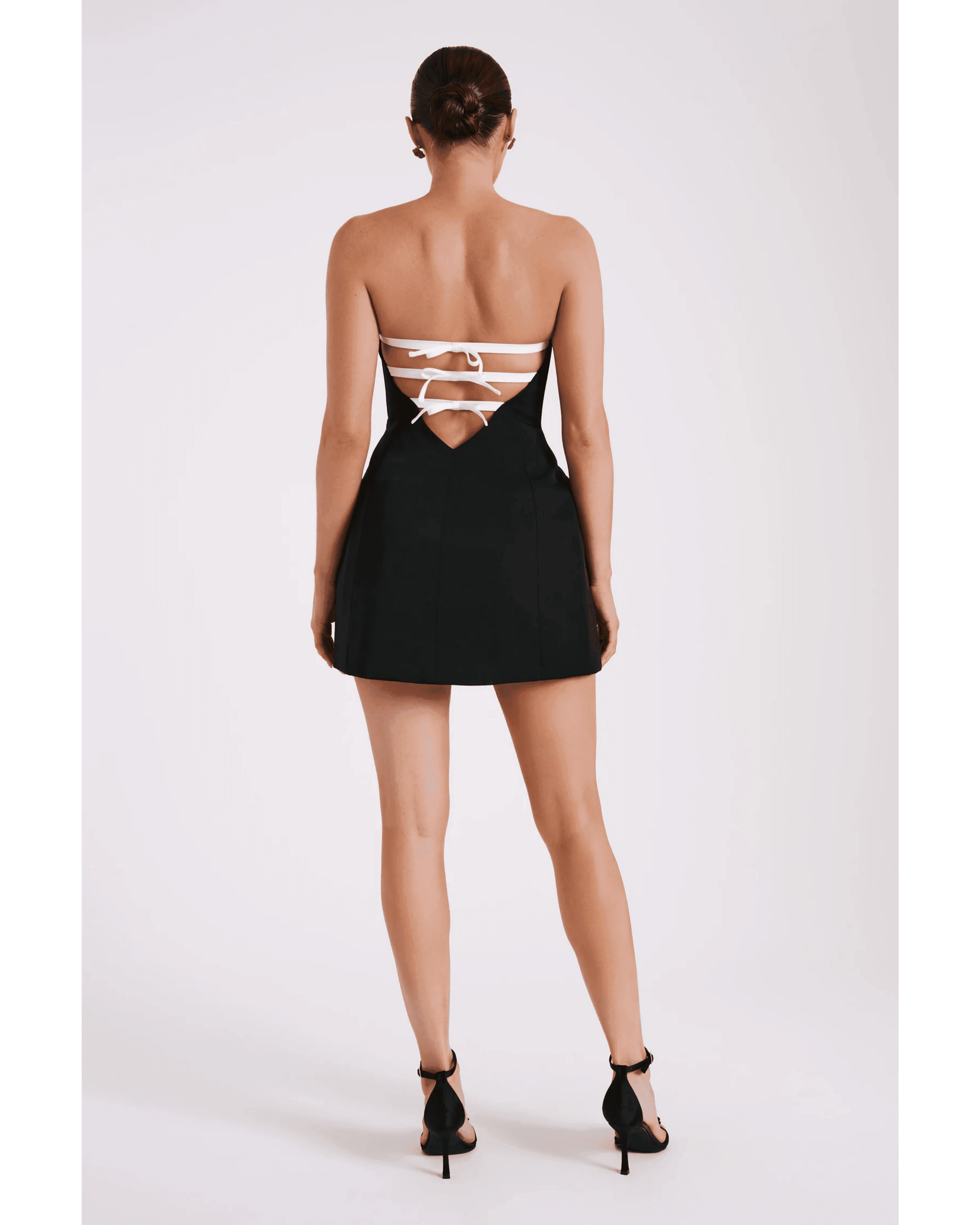Neeka Strapless Bow Back Mini Dress - Endless - UAE Rental and Resale for Women's Fashion