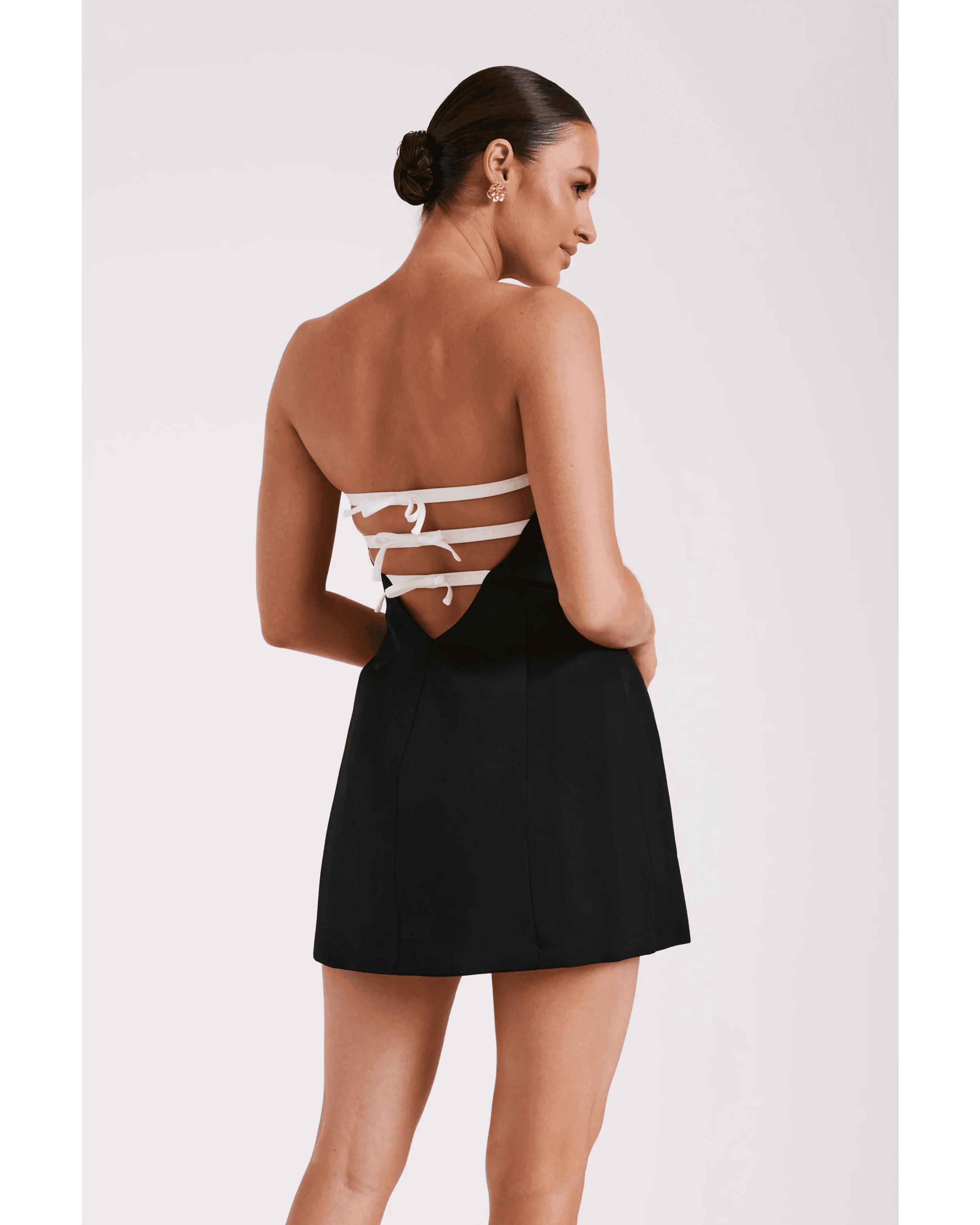 Neeka Strapless Bow Back Mini Dress - Endless - UAE Rental and Resale for Women's Fashion