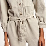 Beige denim jumpsuit with belt and chest pockets — Essentiel Antwerp | Endless UAE