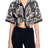 Cropped floral print shirt with black and beige pattern, tie-front detail and kimono sleeves — Sandro | Endless UAE