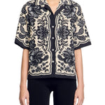 Black and cream floral print short sleeve button-up shirt with scalloped edges and ornate botanical design — Sandro | Endless UAE
