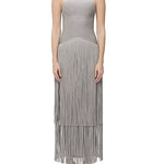 Metallic Kennedy Gown in silver with halter neckline and tiered fringe skirt — Hervé Léger | Endless UAE