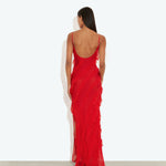 Back view of woman wearing floor-length red textured gown with thin straps and open back — Rat & Boa | Endless UAE