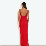Back view of woman wearing floor-length red textured gown with thin straps and open back — Rat & Boa | Endless UAE