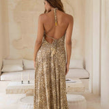 Woman wearing beige leopard print halter dress — Sophia Alexia | Endless UAE