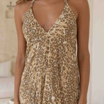 Woman wearing beige leopard print halter dress — Sophia Alexia | Endless UAE
