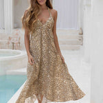Woman wearing beige leopard print halter dress — Sophia Alexia | Endless UAE