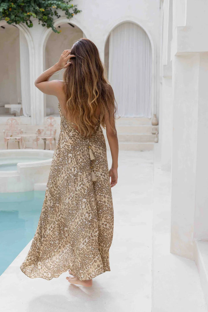 Woman wearing beige leopard print halter dress — Sophia Alexia | Endless UAE