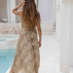 Woman wearing beige leopard print halter dress — Sophia Alexia | Endless UAE