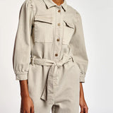 Beige denim jumpsuit with chest pockets and tie waist — Essentiel Antwerp | Endless UAE
