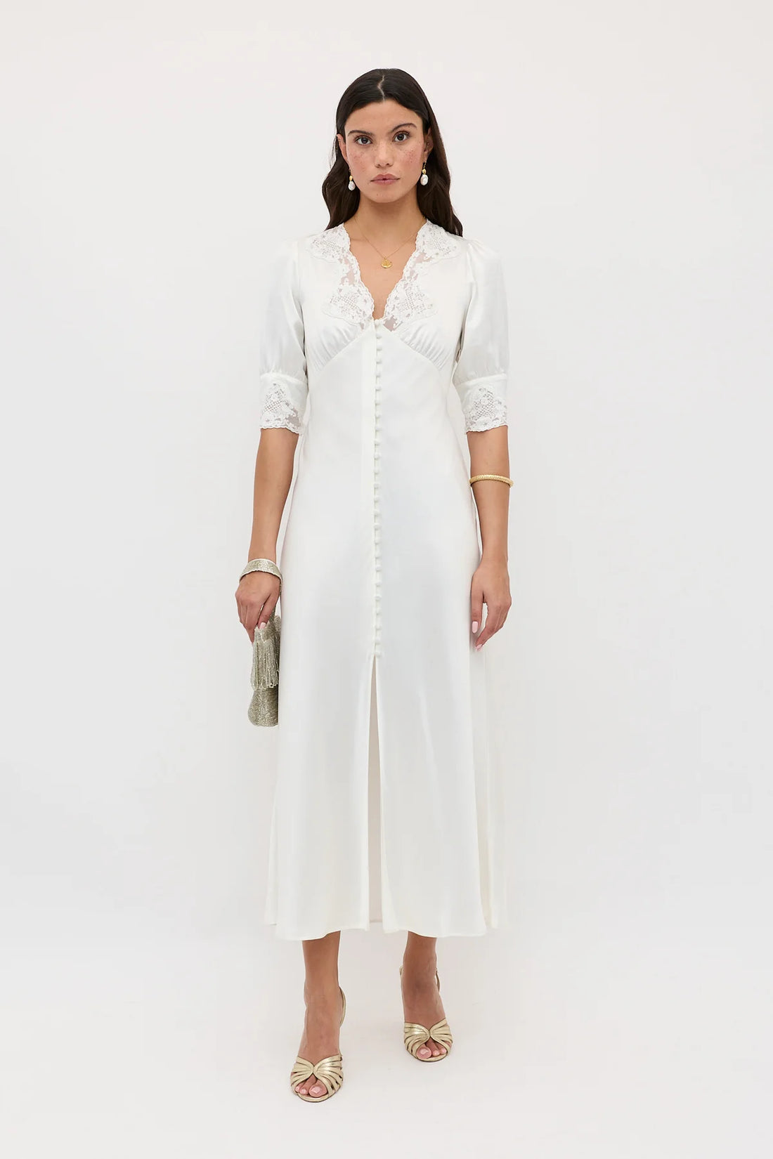 Elegant white midi dress with lace trim collar and cuffs, button-front closure, and center slit by Rixo — Rixo | Endless UAE
