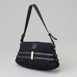 Black canvas shoulder bag with leather trim, gold horsebit detail and adjustable strap — Gucci | Endless UAE