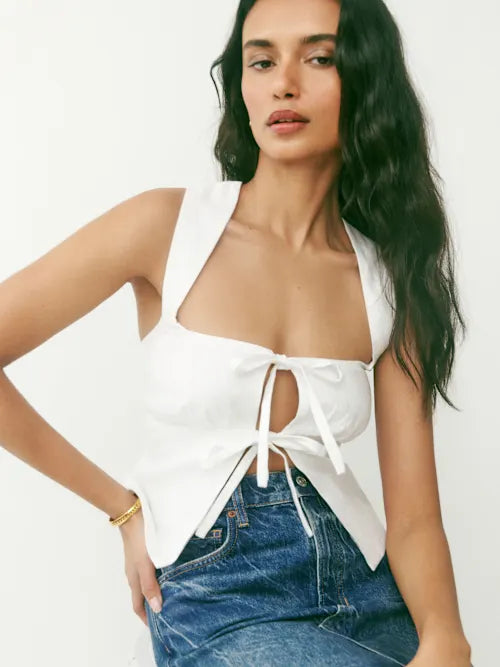 White linen crop top with tie-front cutout detail and wide straps — Reformation | Endless UAE