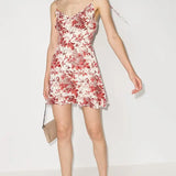 Reformation Esther floral-print mini dress with spaghetti straps and fitted silhouette in red and white pattern — Reformation | Endless UAE