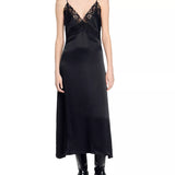 Black satin slip dress with delicate lace trim at V-neckline, featuring thin adjustable straps and midi length silhouette — Sandro | Endless UAE