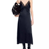 Black satin slip dress with delicate lace trim neckline, midi length, adjustable spaghetti straps — Sandro | Endless UAE