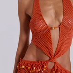 Woman wearing orange beaded crochet halter maxi dress with open back — Jaded London | Endless UAE