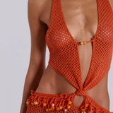 Woman wearing orange beaded crochet halter maxi dress with open back — Jaded London | Endless UAE