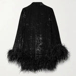 Black feather-trimmed devore dress with high neckline on model — Taller Marmo | Endless UAE