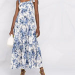 White and blue floral-print sleeveless maxi dress with tiered ruffled skirt and tie shoulder straps — Zimmermann | Endless UAE