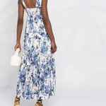 Blue and white floral-print maxi dress with tie shoulder straps, smocked back detail, and tiered skirt — Zimmermann | Endless UAE