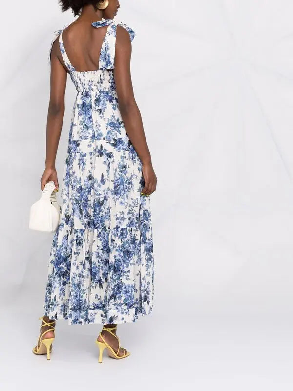 Blue and white floral-print maxi dress with tie shoulder straps, smocked back detail, and tiered skirt — Zimmermann | Endless UAE