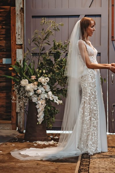 Naomi wedding dress by JESSICA COUTURE features delicate lace detailing with elegant backless design — JESSICA COUTURE | Endless UAE