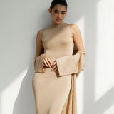 Elegant champagne gold sleeveless dress with matching long flowing sleeves and clutch bag — Nora The Label | Endless UAE
