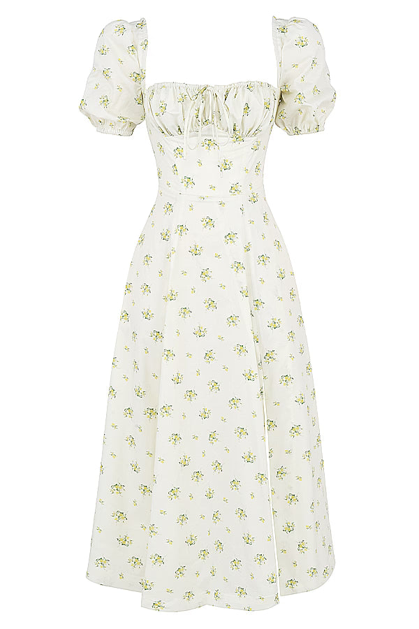 Woman wearing ivory floral puff sleeve midi dress with thigh slit — House of CB | Endless UAE
