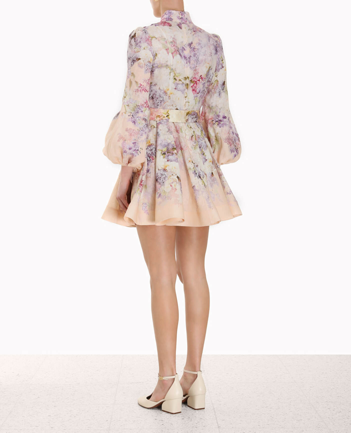 Floral printed mini dress with high neck, balloon sleeves, and flared skirt in soft peach tones — ZIMMERMANN | Endless UAE