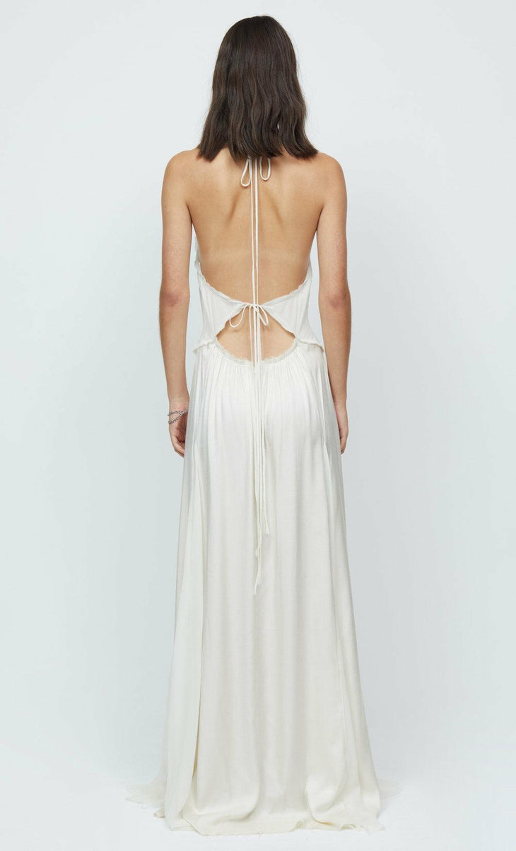 Rear view of woman wearing white halter maxi dress with open back and tie details — Bec & Bridge | Endless UAE