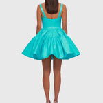 Woman wearing a turquoise structured mini dress with sweetheart neckline and full skirt — Leo Lin | Endless UAE