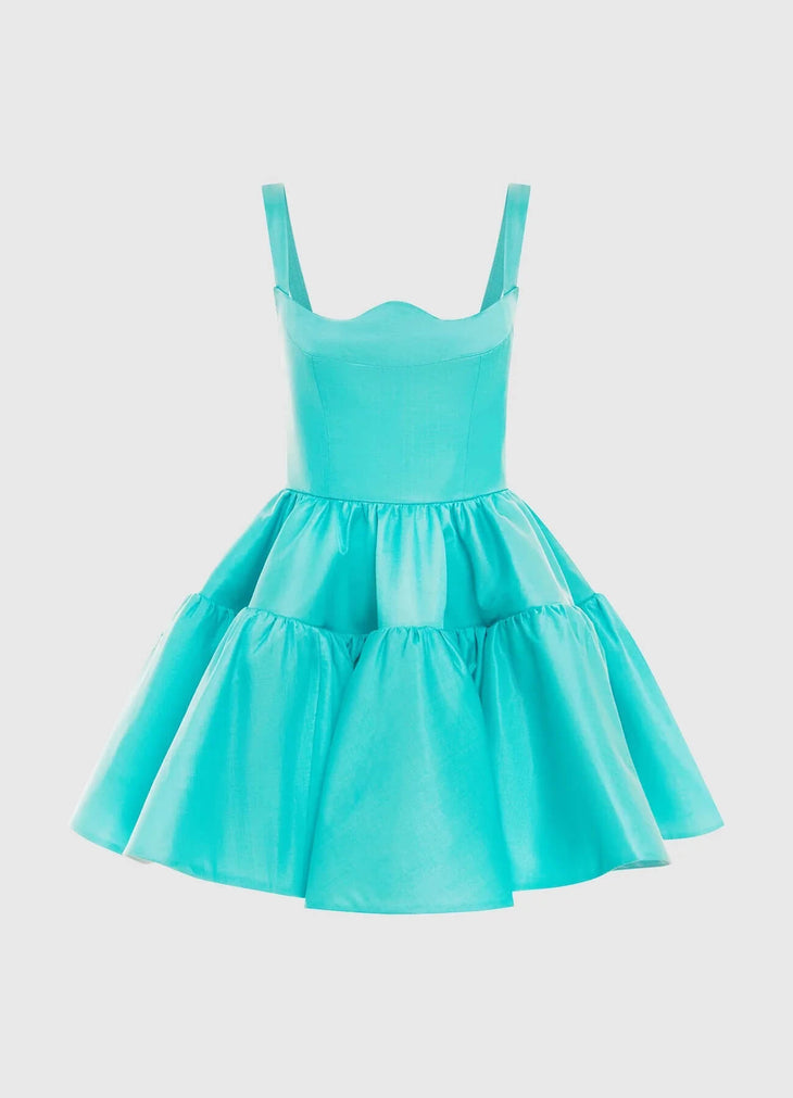 Woman wearing a turquoise structured mini dress with sweetheart neckline and full skirt — Leo Lin | Endless UAE