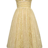 Woman wearing gold metallic lace tulle strapless midi gown with ruched waist — House of CB | Endless UAE