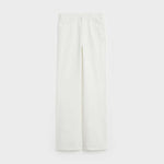 Folded white denim jeans with visible back pocket detail — Celine | Endless UAE
