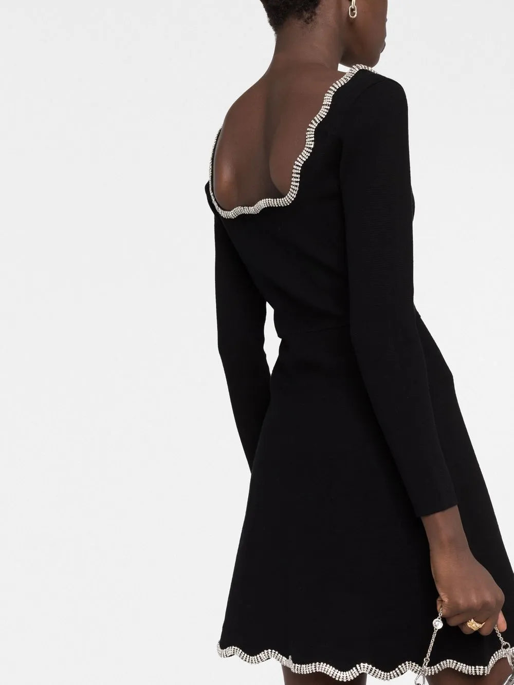 Black long-sleeved mini dress with scalloped crystal rhinestone trim along neckline and hem, shown from back view — Sandro | Endless UAE