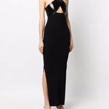 Black midi dress with criss-cross patent leather halter neck, cutout detail and side slit — Courrèges | Endless UAE