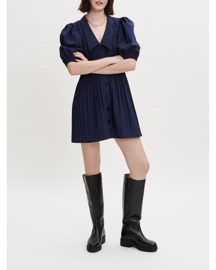 Navy pleated dress with collar and puff sleeves, styled with black knee-high boots — Maje | Endless UAE