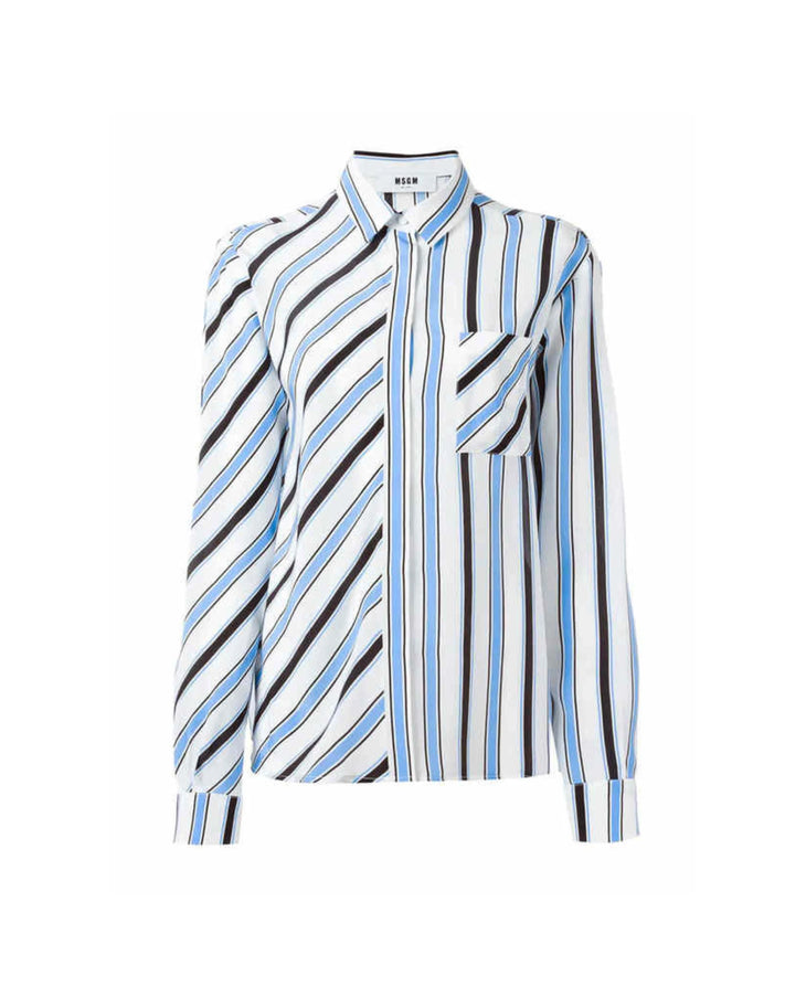 Striped silk shirt with blue, black and white diagonal stripes paired with dark blue jeans — M.S.G.M | Endless UAE