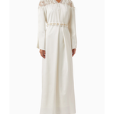 Elegant white maxi dress with lace shoulder detail and decorative braided belt at waist — Nass | Endless UAE