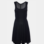 Black sleeveless midi dress with textured embroidered knit, mesh neckline detail, and flared skirt — Alaia | Endless UAE