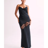 Woman wearing black satin maxi dress with lace side detail and halter neckline — Meshki | Endless UAE