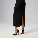 Black pointed-toe pumps with beige leather insole and white tissue paper insert — Endless | Endless UAE