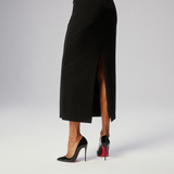 Black pointed-toe pumps with beige leather insole and white tissue paper insert — Endless | Endless UAE