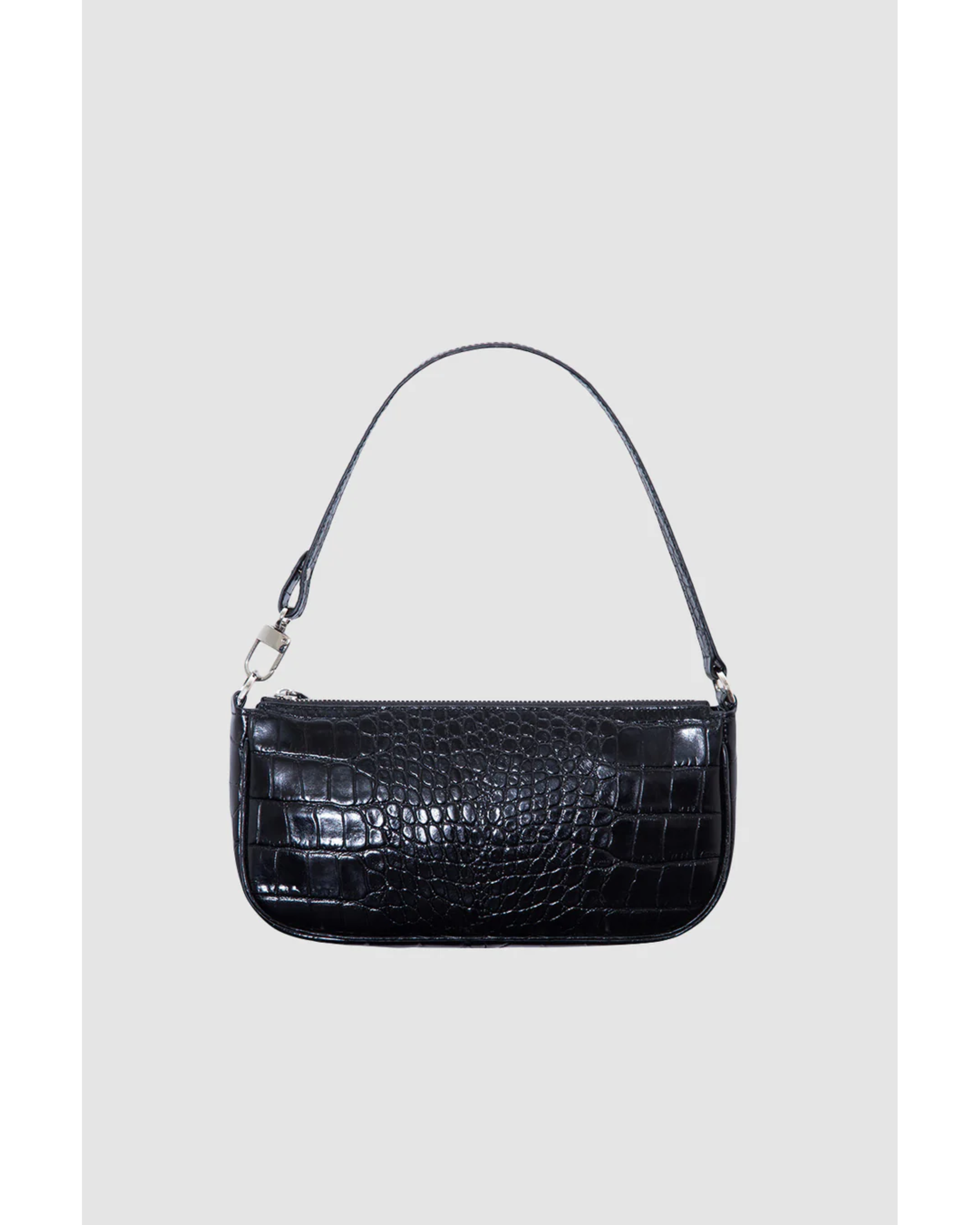 Black crocodile embossed leather shoulder bag held in hand against white background — By Far | Endless UAE