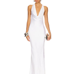 Woman wearing white halter drape bias gown with silver cuff bracelet — Norma Kamali | Endless UAE