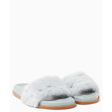 Light blue mink-fur slides with tan leather sole and footbed, shown from front angle — Valentino Garavani | Endless UAE
