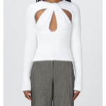 White fuzzy long-sleeve top with geometric chest cutouts paired with grey tailored trousers — Coperni | Endless UAE