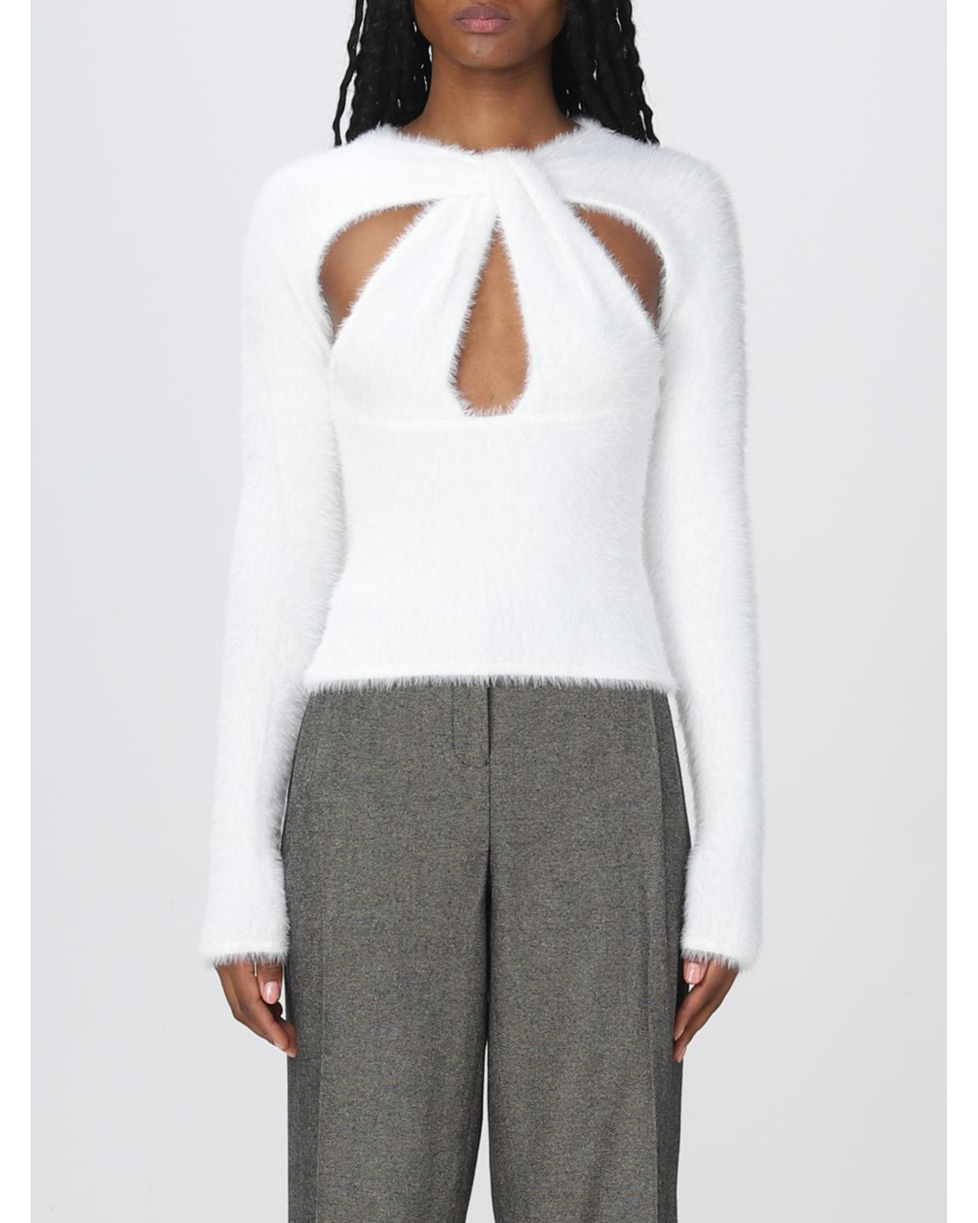 White fuzzy long-sleeve top with geometric chest cutouts paired with grey tailored trousers — Coperni | Endless UAE