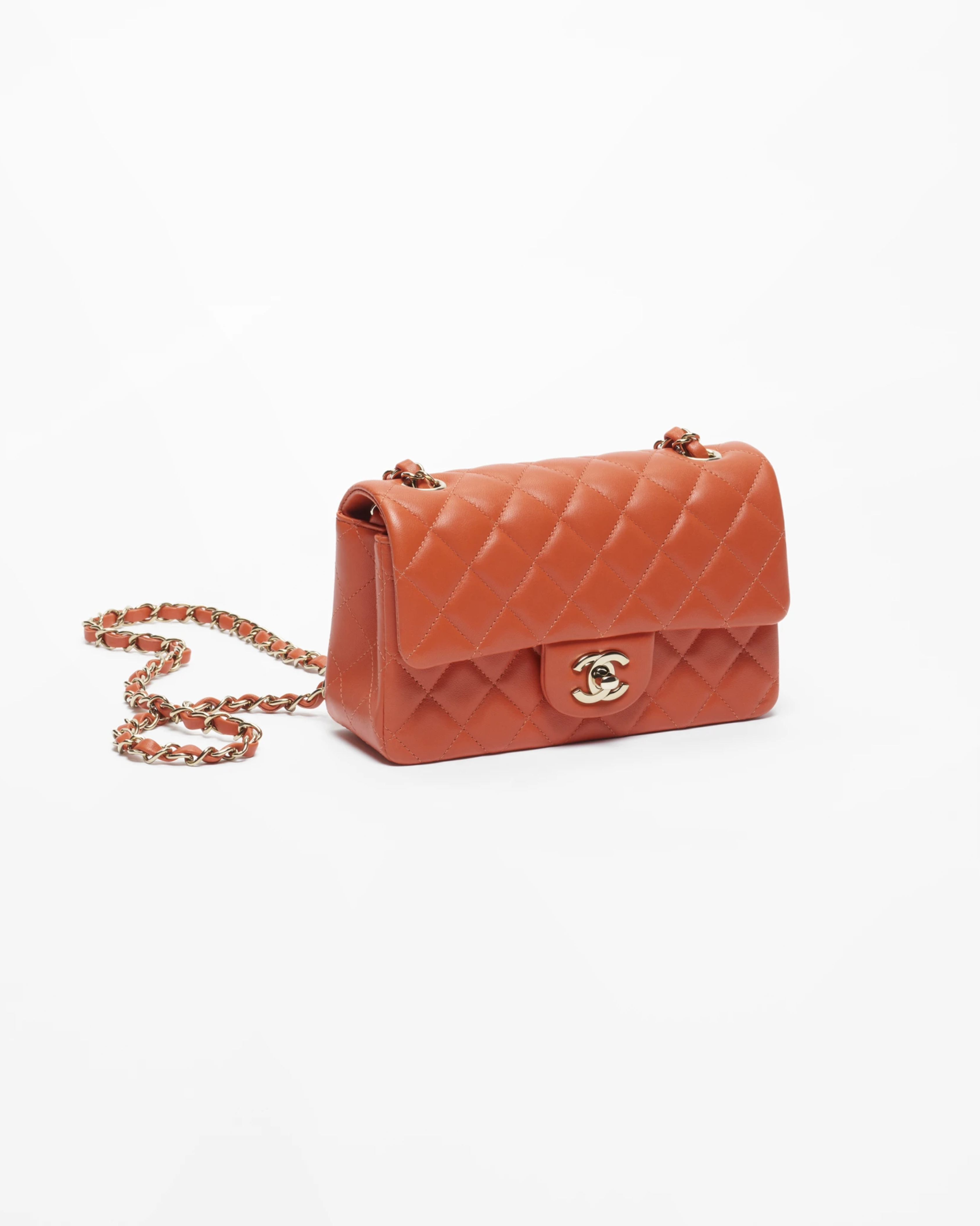 Coral quilted lambskin mini classic handbag with gold CC logo — Chanel | Endless UAE